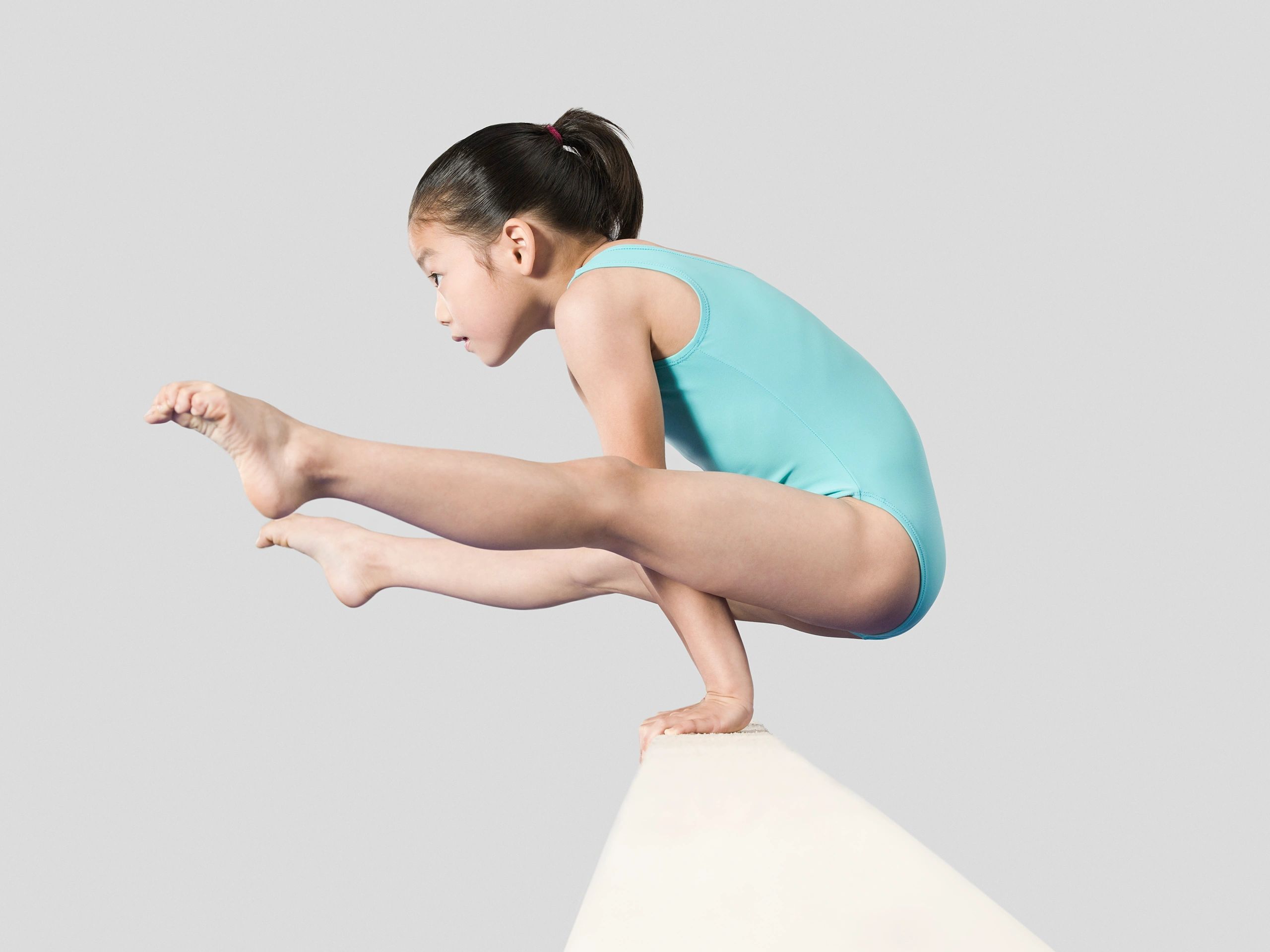 Gymnastics class with instructor and children